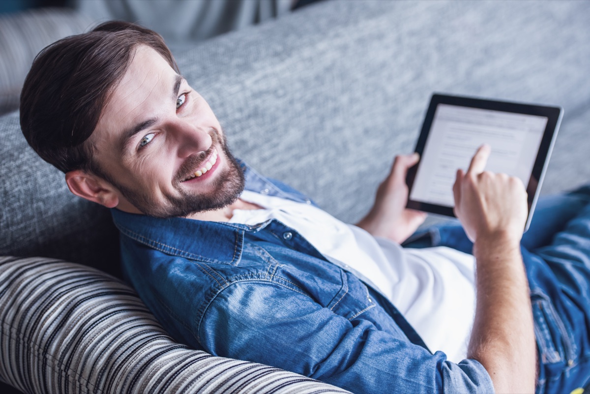 Patient reading a dental treatment plan on their phone at home